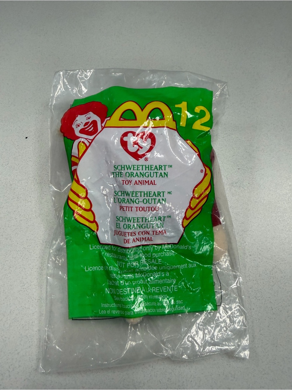 McDonald's Green and Red Sweetheart the Orangutan Toy Packaging